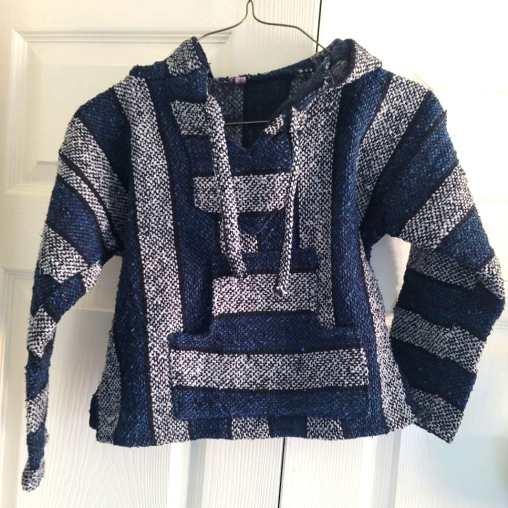 Surf-themed poncho with a hood